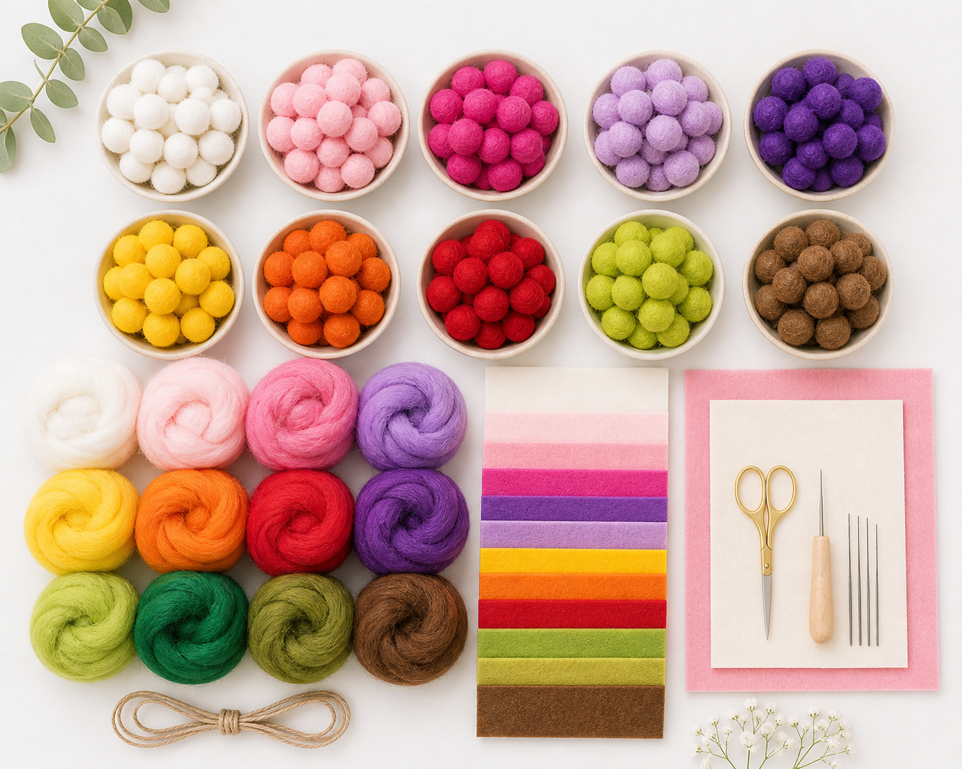 Felt balls and wool felt supplies arranged by color in a clean composition